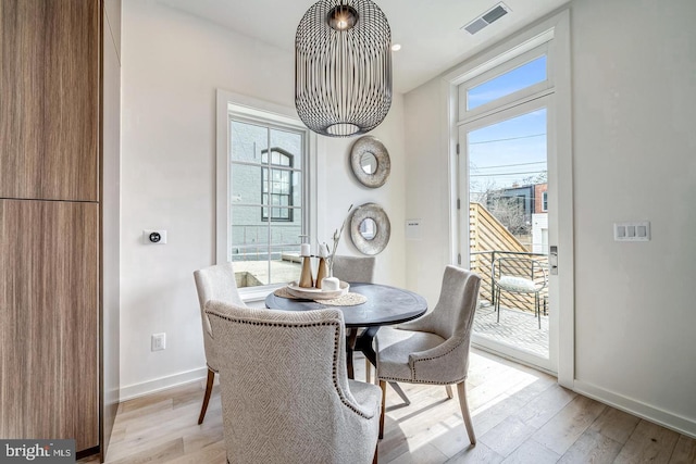 dining area with light wood-type flooring