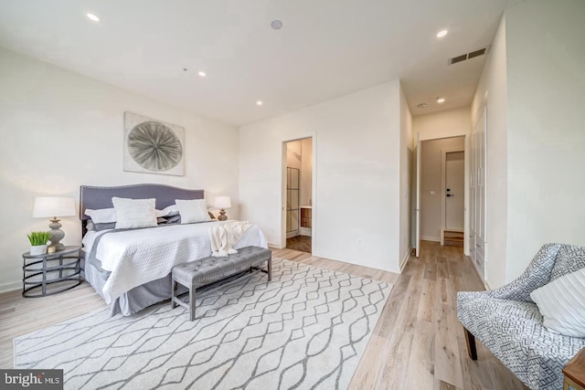 bedroom featuring light wood-type flooring