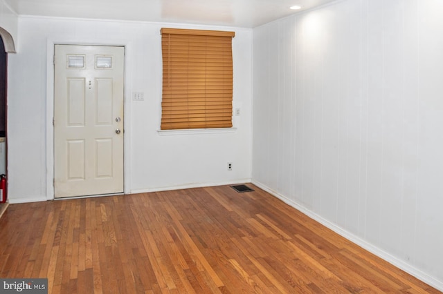 entrance foyer featuring hardwood / wood-style floors