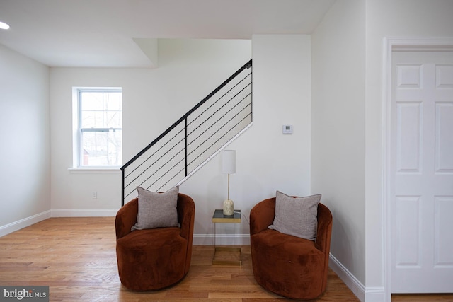 living area featuring light hardwood / wood-style floors