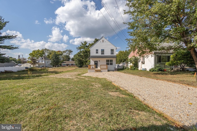 view of front of house with a front lawn