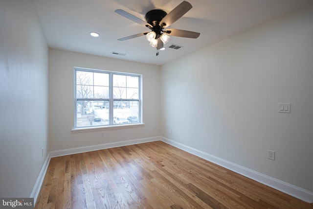 unfurnished room featuring light hardwood / wood-style floors and ceiling fan