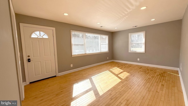 entrance foyer with light hardwood / wood-style floors