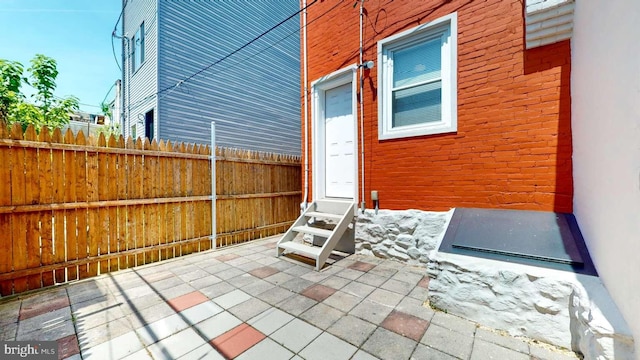 view of patio / terrace with fence