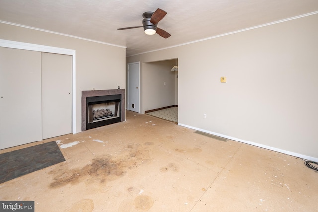 unfurnished living room with crown molding and ceiling fan