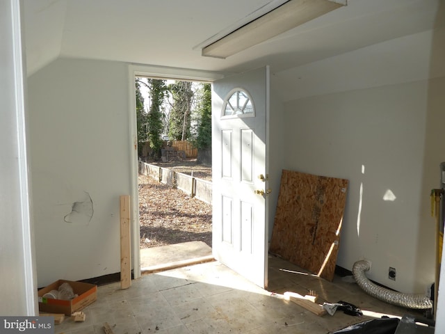 doorway with vaulted ceiling