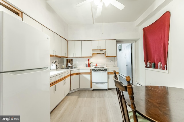 kitchen featuring white cabinetry, white appliances, light hardwood / wood-style floors, and ceiling fan