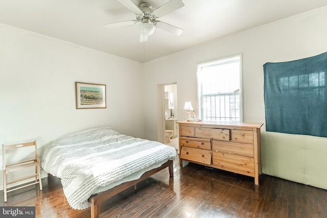 bedroom featuring dark hardwood / wood-style flooring and ceiling fan