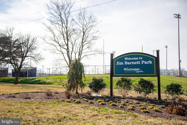 view of property's community with a yard