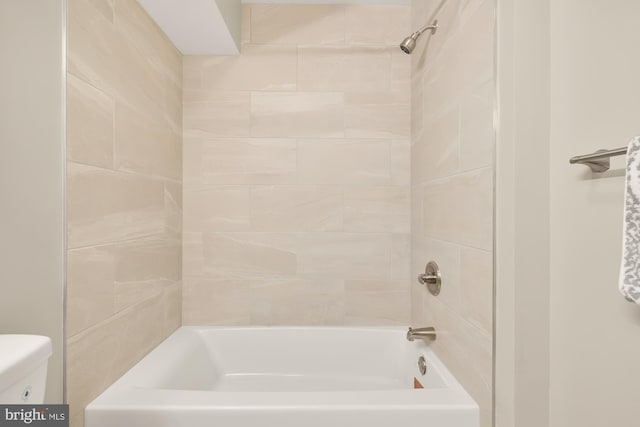 full bathroom featuring toilet and bathing tub / shower combination