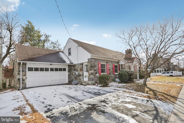 view of front of property featuring a garage