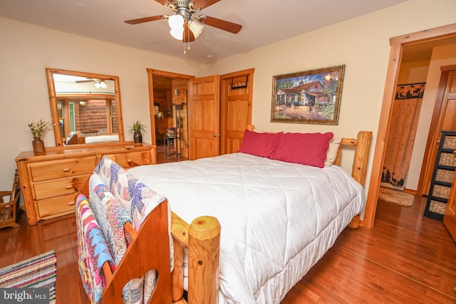 bedroom featuring hardwood / wood-style floors and ceiling fan