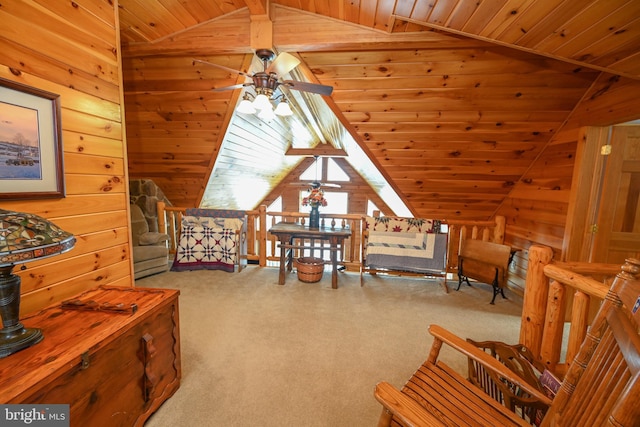 carpeted bedroom featuring wood ceiling, wooden walls, and vaulted ceiling