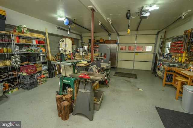 garage featuring a garage door opener and a workshop area