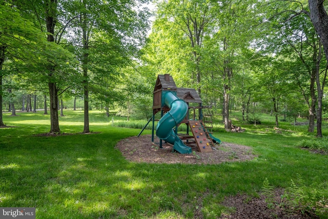 view of playground featuring a lawn