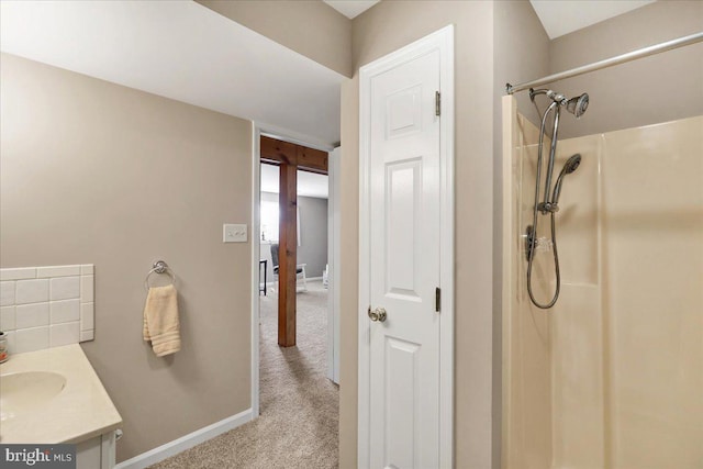 bathroom featuring vanity and walk in shower