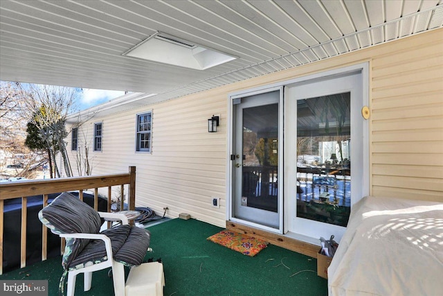 view of snow covered deck