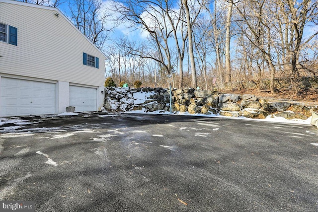 exterior space with a garage