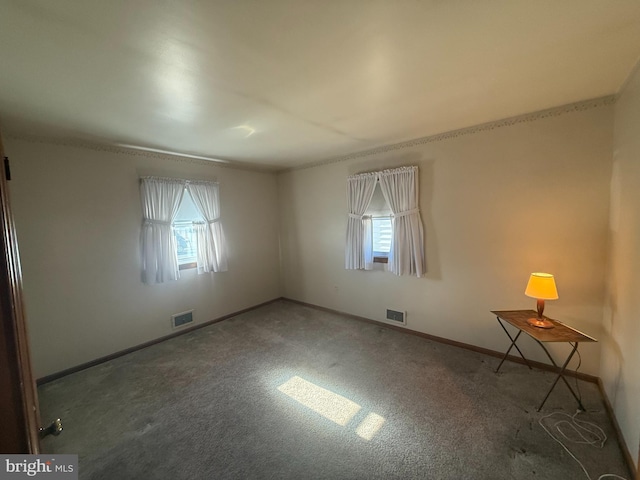 unfurnished room with plenty of natural light