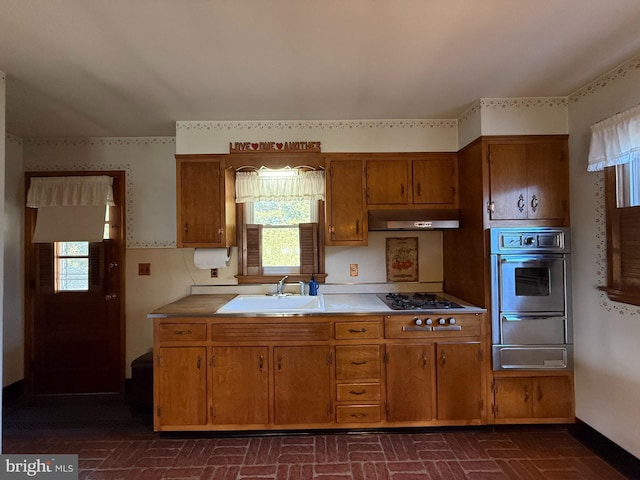 kitchen with appliances with stainless steel finishes and sink