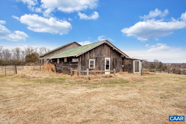 view of home's exterior featuring a lawn