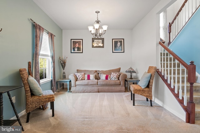 sitting room featuring light carpet and a notable chandelier