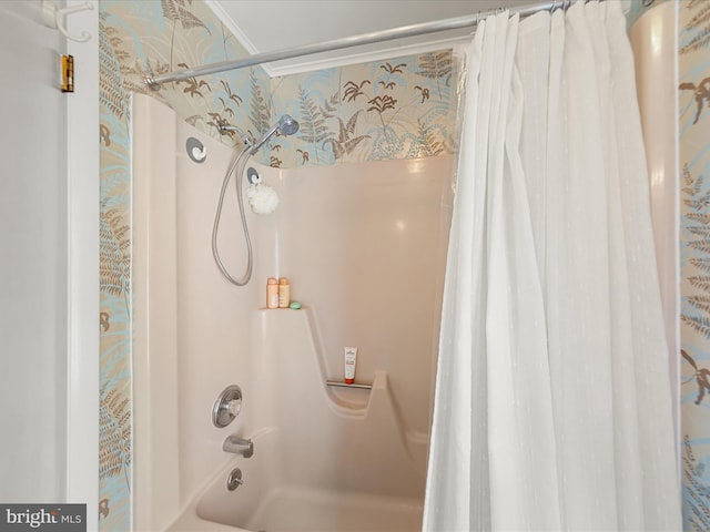 bathroom featuring shower / tub combo with curtain