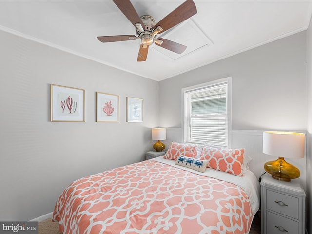 bedroom featuring ornamental molding, carpet floors, and ceiling fan