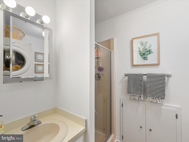 bathroom featuring crown molding, vanity, and a shower with shower door