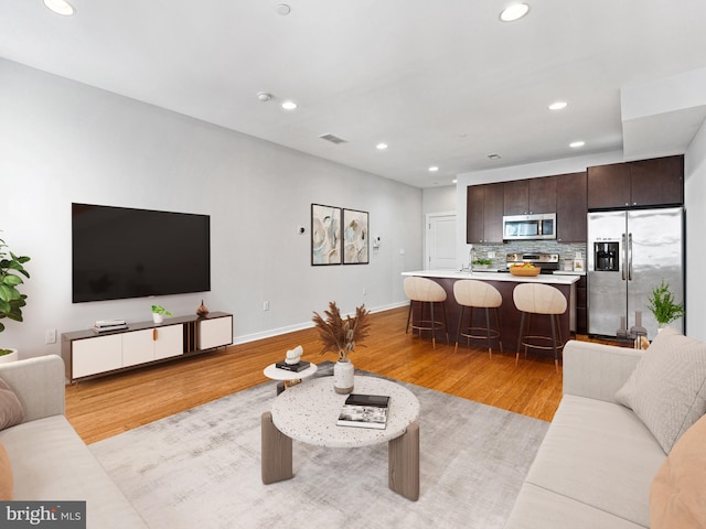 living room featuring light hardwood / wood-style flooring