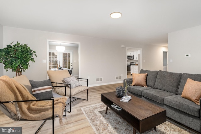 living room with light wood-type flooring