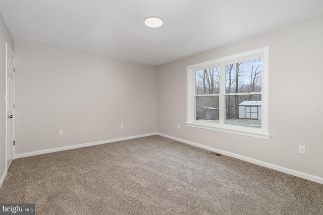 view of carpeted spare room