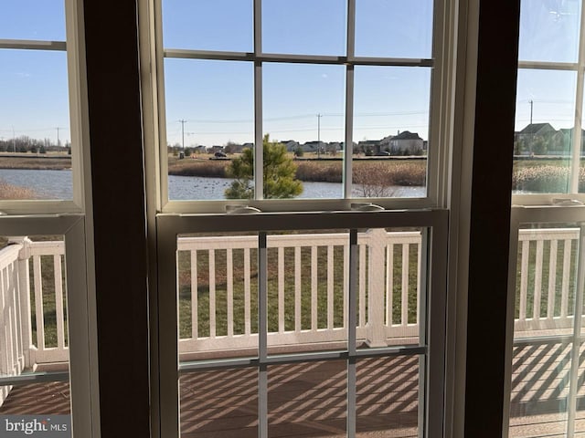 doorway featuring a water view