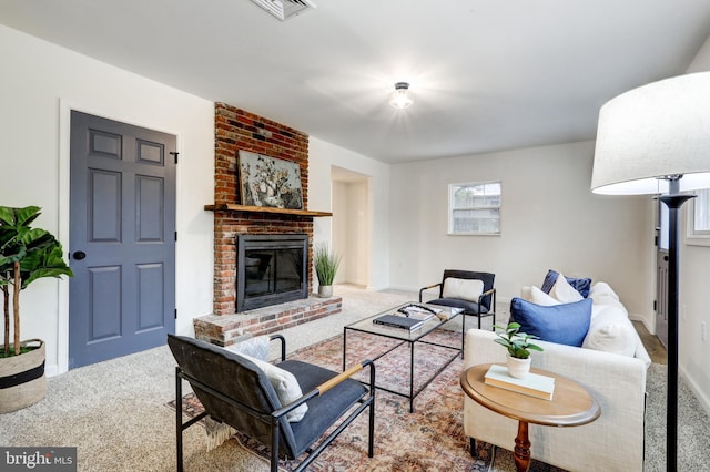 living room featuring a fireplace and light carpet