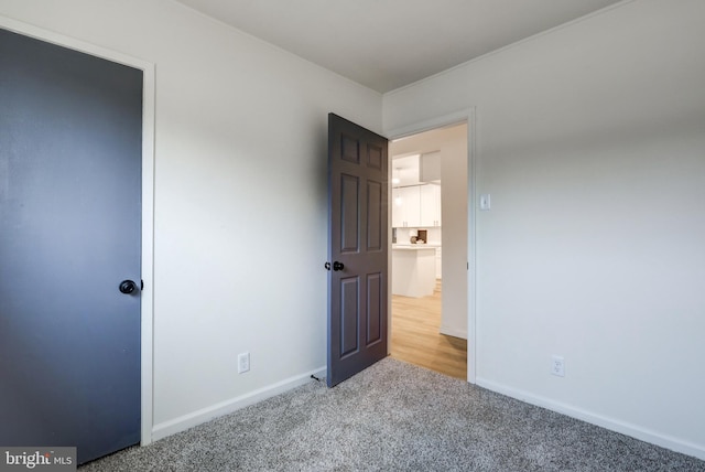 unfurnished bedroom featuring carpet floors