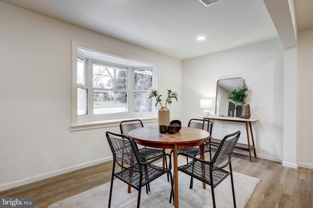 dining room featuring light wood-type flooring