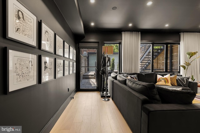 living room with light hardwood / wood-style floors