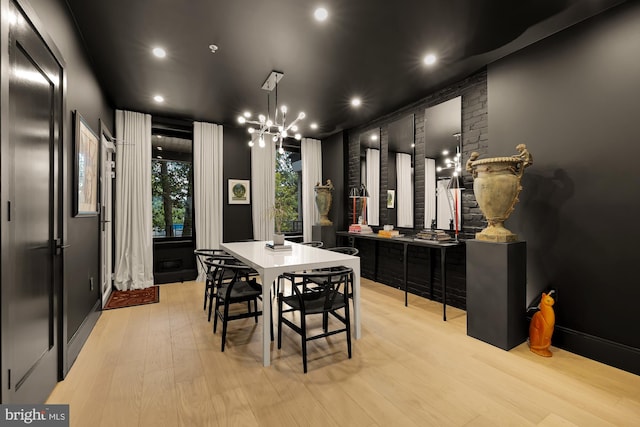 dining area with light hardwood / wood-style floors