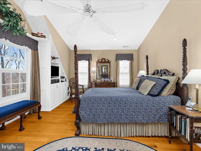 bedroom featuring light hardwood / wood-style floors and ceiling fan