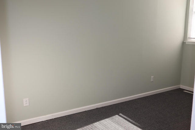 unfurnished room with carpet floors