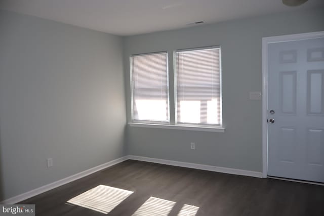 entrance foyer with dark hardwood / wood-style flooring