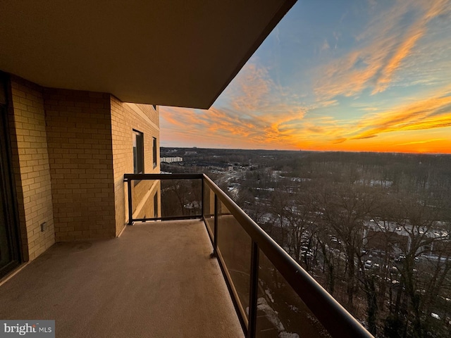 view of balcony at dusk