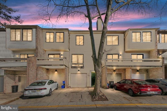 view of front of property featuring a garage