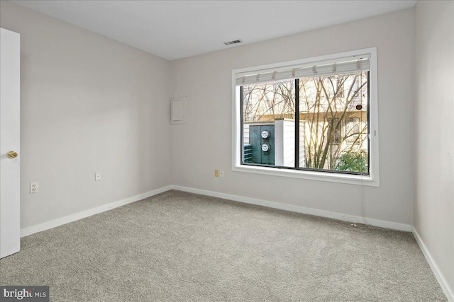 empty room featuring carpet flooring