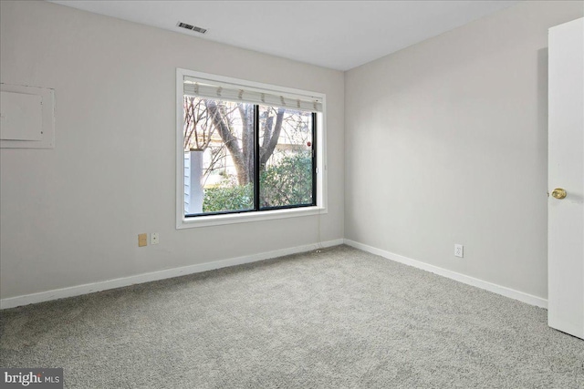 unfurnished room featuring carpet flooring