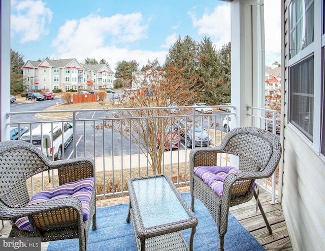 balcony featuring a residential view