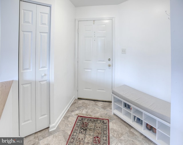 mudroom featuring baseboards