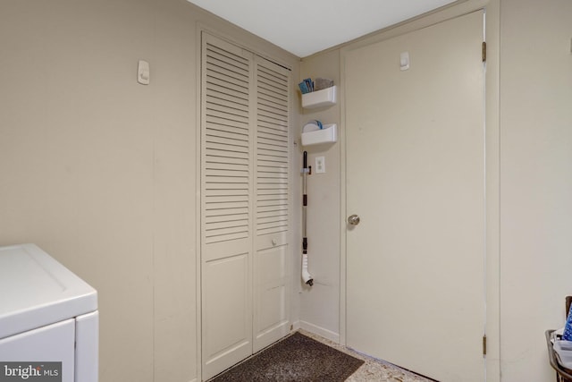 laundry room with laundry area and washer and clothes dryer