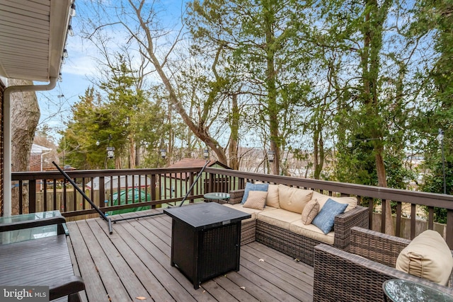 deck featuring an outdoor living space