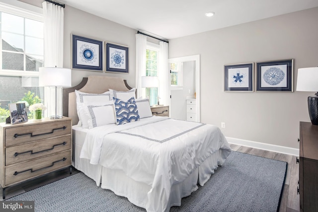 bedroom featuring dark hardwood / wood-style floors